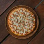 عجينة البيتزا الإيطالية – الوصفة المثالية لصنع بيتزا لذيذة في المنزل